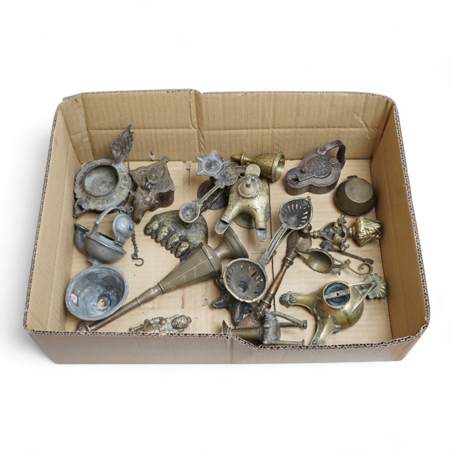 A group of small Middle Eastern mixed metalware lamps, burners etc